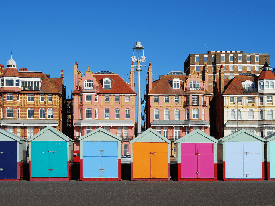 The vibrant and picturesque sun huts of Brighton, adding a splash of color and charm to the iconic seafront.
