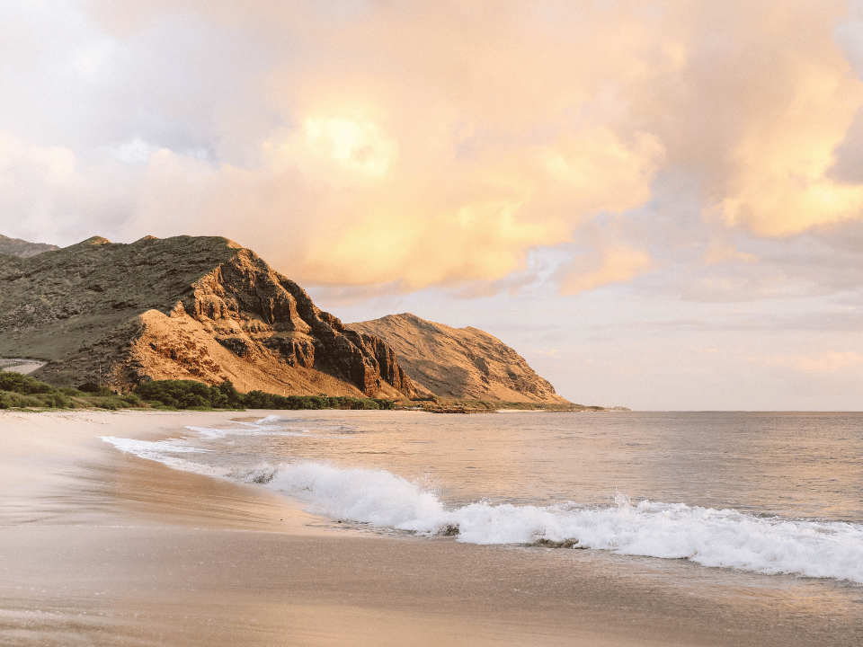 A beach at sunset in Hawaii
