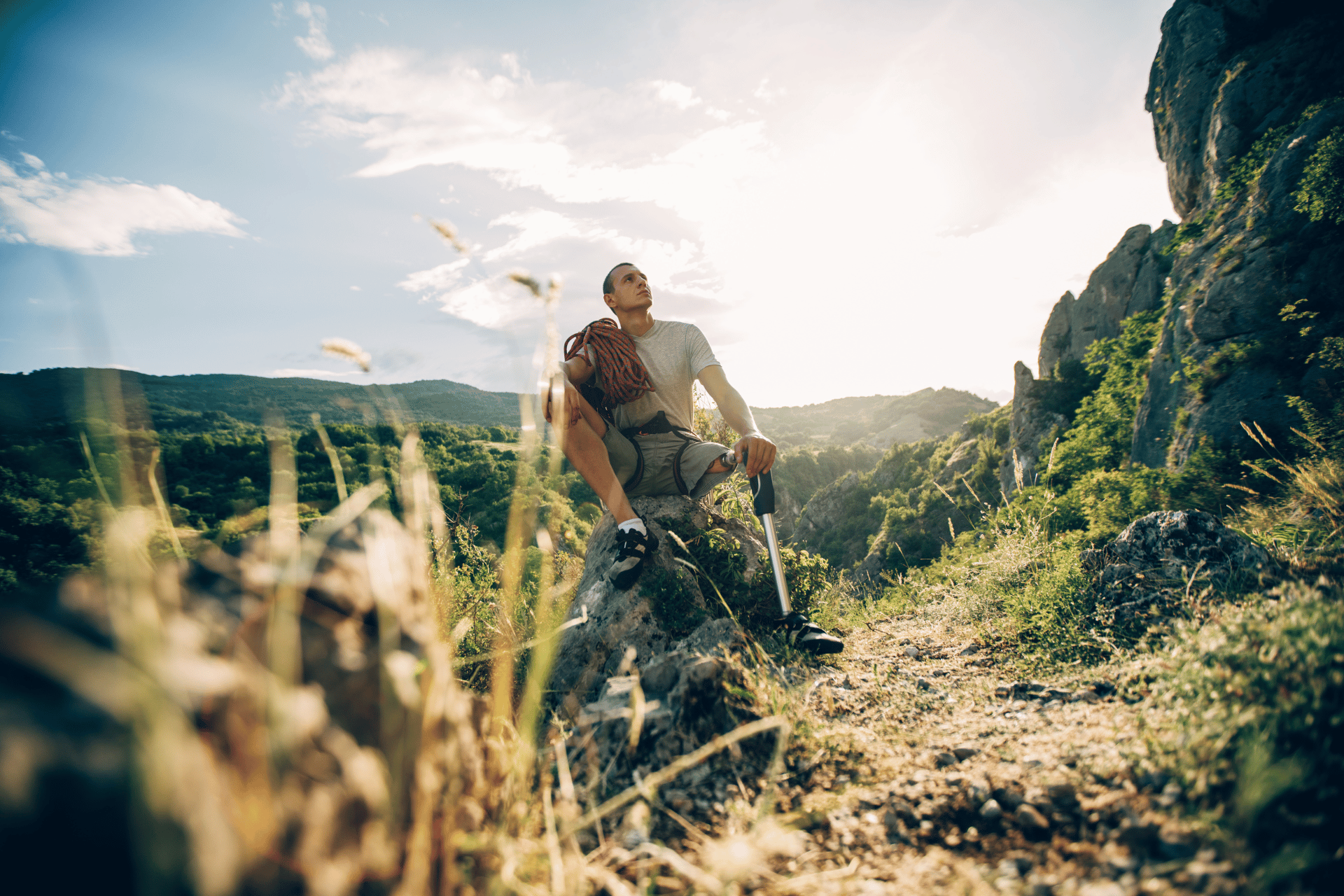 A man resting whilst hiking