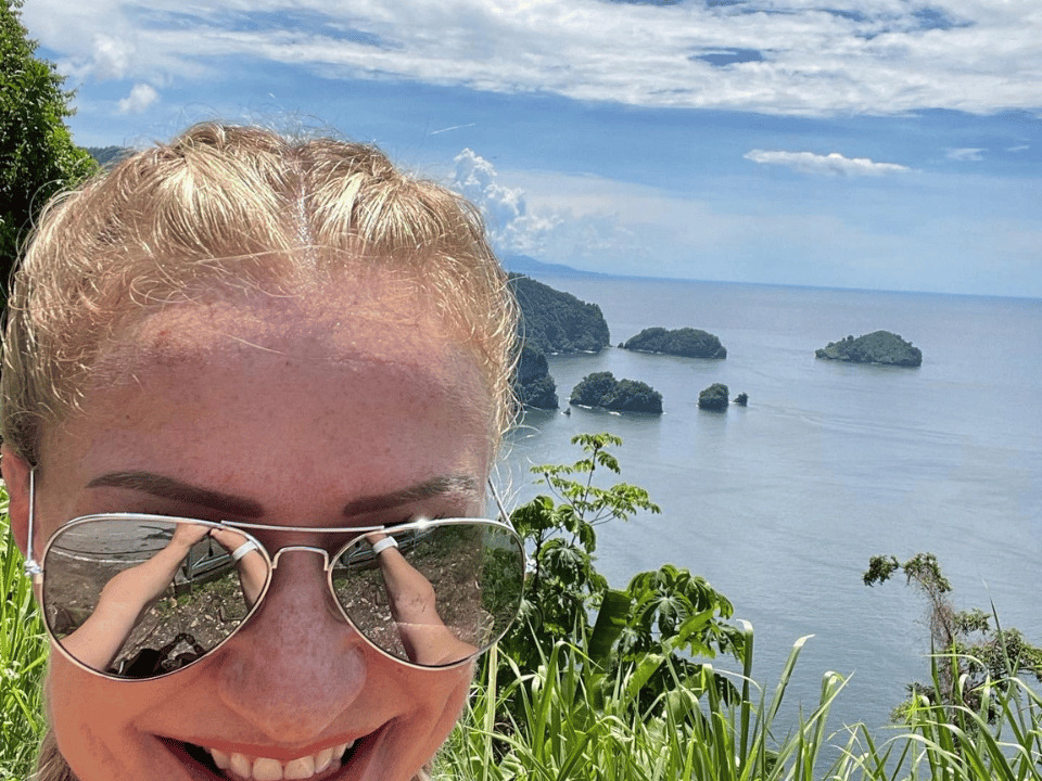 Renee in foreground with the islands behind her 