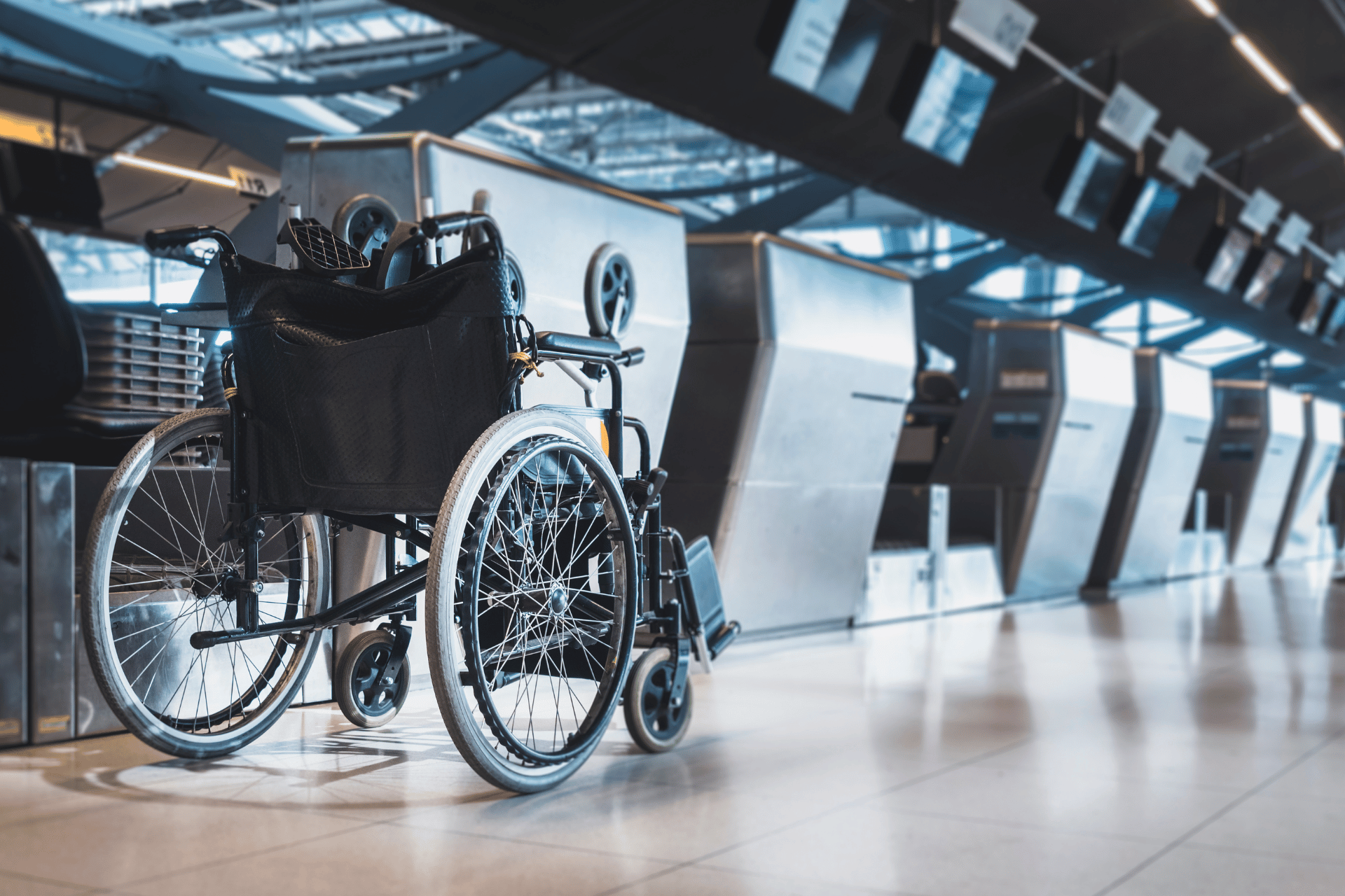 A wheelchair at the checkin of an airport