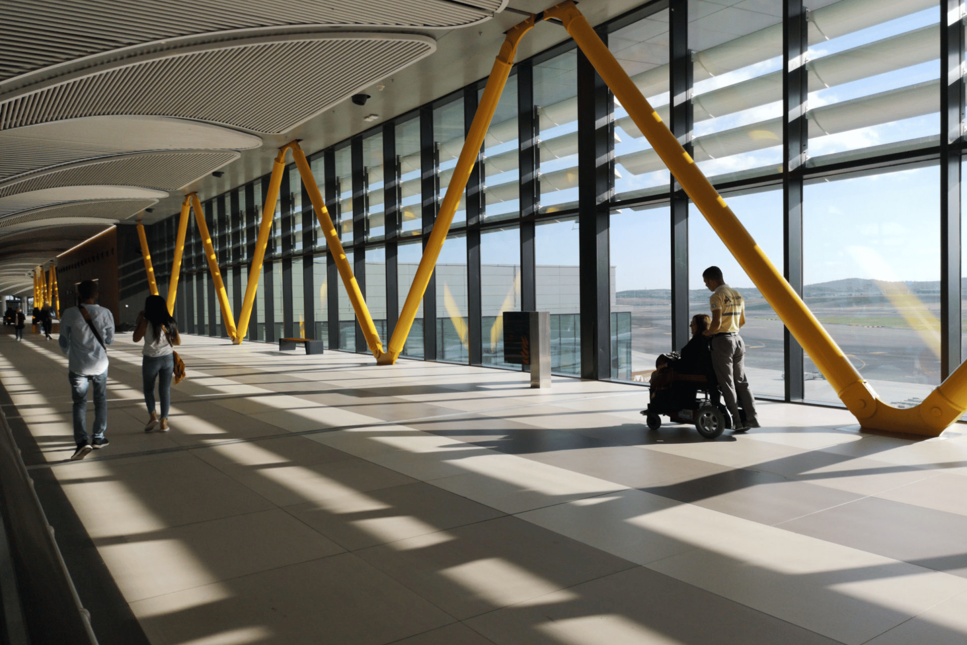 A man in a wheelchair in an airport