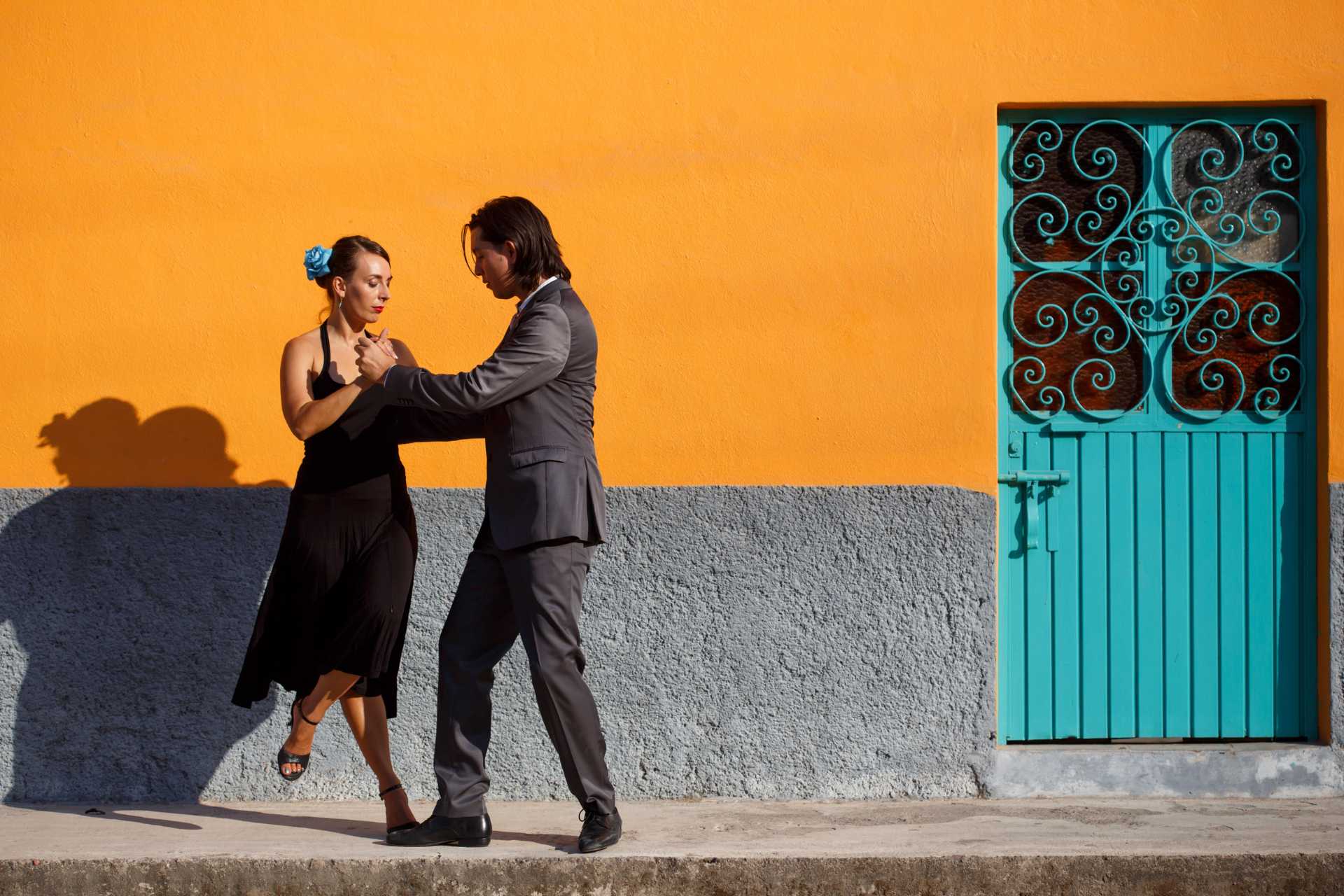 Man and Woman Dancing on the Sidewalk in Argentina