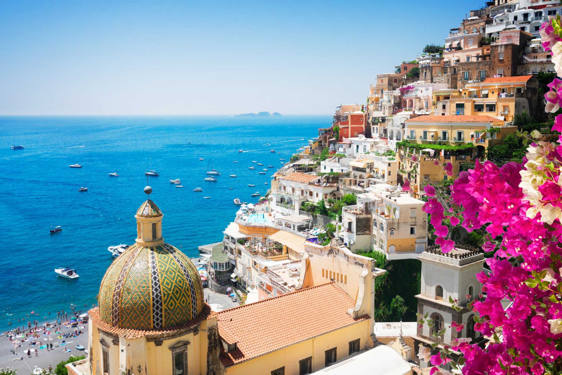 View of the water in Positano with flowers, Italy.