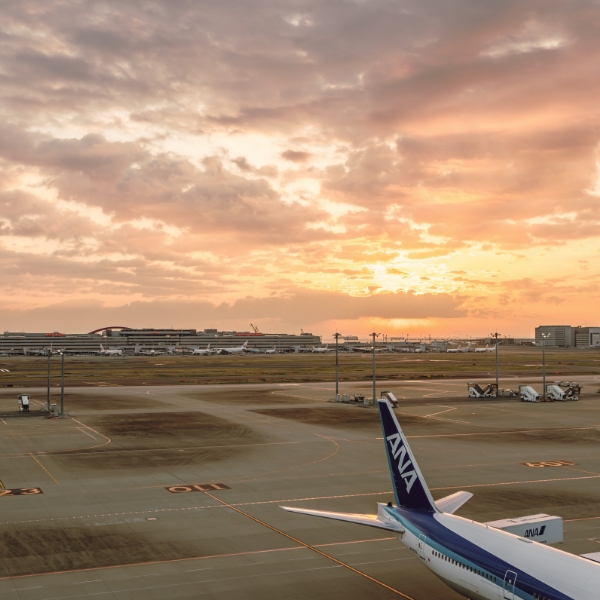 Tokyo International Airport at sunrise sunset panorama, Haneda Airport in Tokyo, Japan.